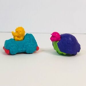 90’s prehistoric car toy and dinosaur stone age turtle with helmets